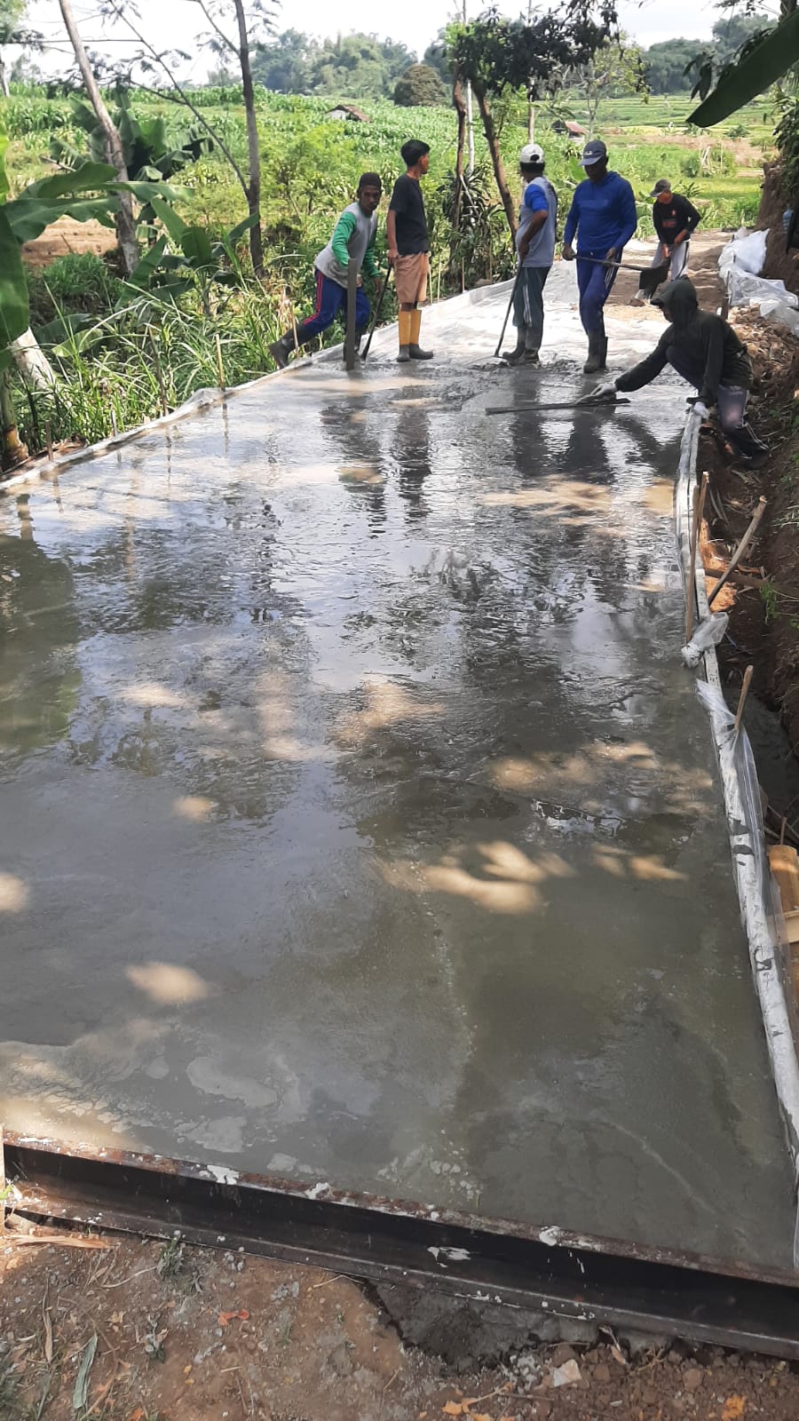 Pengecoran jalan usaha tani